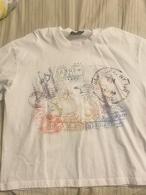 White Long-Sleeve Graphic Crewneck Shirt with Travel Stamp Design